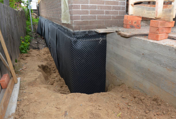 Happy homeowners after waterproofing job in Stevens Point